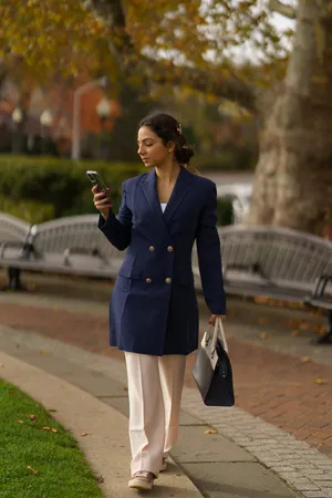 Elegant Navy Blue Coat For A Sophisticated Look Wallpaper