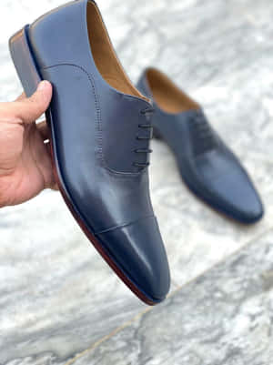 Elegant Navy Blue Dress Shoes Wallpaper
