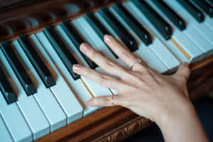 Elegant Piano Playing Hands.jpg Wallpaper