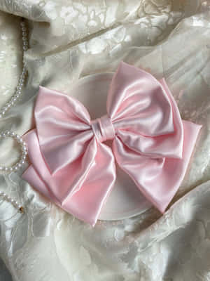 Elegant Pink Satin Bow Wallpaper