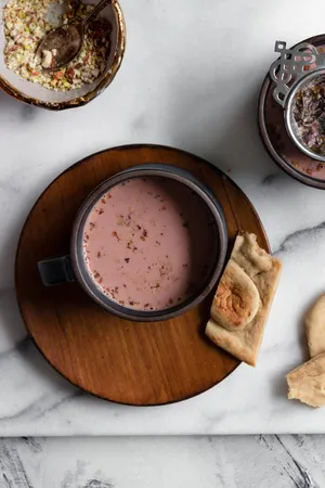 Elegant Pink Tea In A Beautiful Ceramic Cup Wallpaper