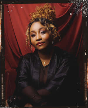 Elegant Portrait Against Red Backdrop Wallpaper