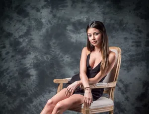 Elegant Portrait Woman Classic Chair Wallpaper