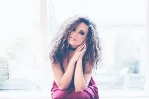 Elegant Portrait Woman Window Light Wallpaper