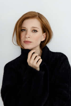 Elegant Portraitin Black Turtleneck Wallpaper