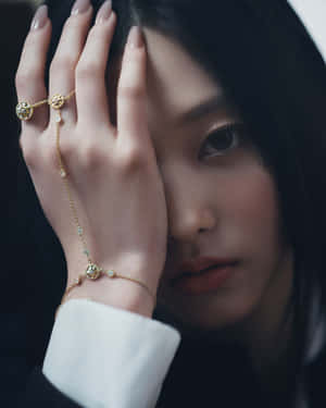 Elegant Portraitwith Gold Jewelry Wallpaper