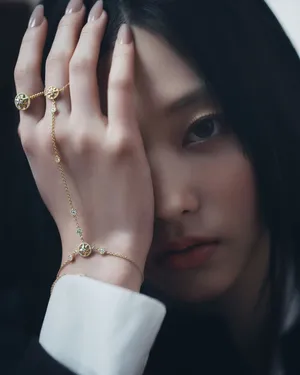 Elegant Portraitwith Gold Jewelry Wallpaper