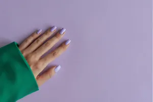 Elegant Purple Manicureon Hand Wallpaper