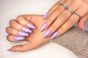 Elegant Purple Stiletto Nails Wallpaper