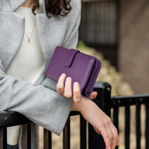 Elegant Purple Wallet Fashion Accessory Wallpaper