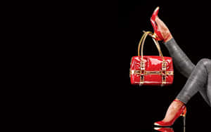Elegant Red Handbag For A Stylish Look Wallpaper