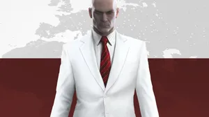 Elegant Red Tie On A Gray Suit Wallpaper