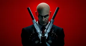 Elegant Red Tie On Black Suit Wallpaper