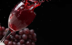 Elegant Red Wine Glass Wallpaper