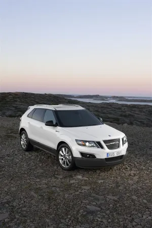 Elegant Saab 9-4x On An Open Road Wallpaper