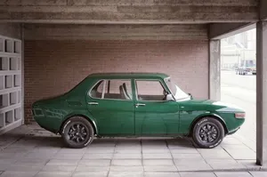 Elegant Saab 99 Gliding On The Road Wallpaper