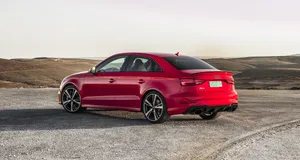 Elegant Sedan In Motion Wallpaper