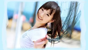 Elegant Shu Qi Posing In A Beautiful Dress Wallpaper