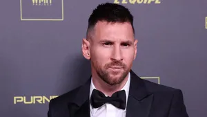 Elegant Soccer Starin Black Suit Wallpaper