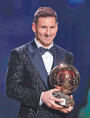 Elegant Soccer Starwith Trophy Wallpaper