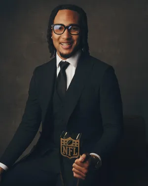 Elegant Sportsmanwith N F L Award Wallpaper