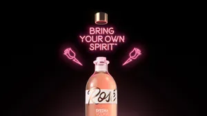 Elegant Svedka Flavored Vodka Rose In Open Bottle Wallpaper