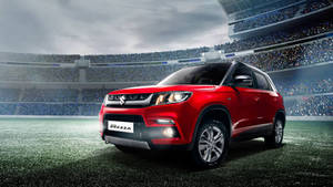 Elegant Two-tone Suzuki Vitara In Natural Setting Wallpaper