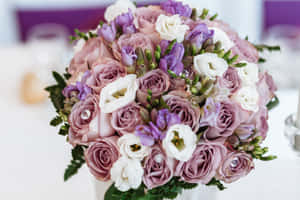 Elegant Wedding Bouquet In Bride's Hands Wallpaper