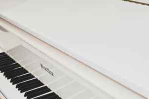 Elegant White Wurlitzer Piano Wallpaper