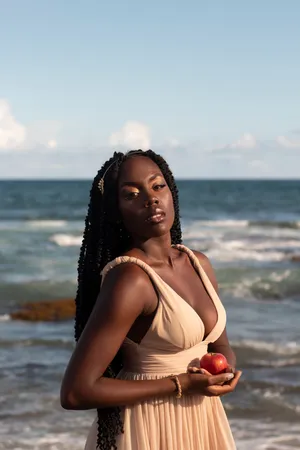 Elegant Woman Beach Portrait Wallpaper