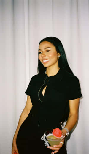 Elegant Woman Holding Cocktail Wallpaper