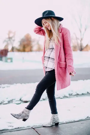 Elegant Woman In A Stunning Pink Coat Wallpaper