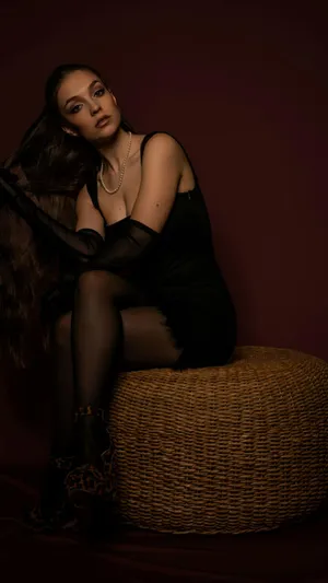 Elegant_ Woman_in_ Black_ Dress_ Portrait Wallpaper