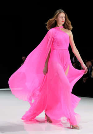 Elegant Woman In Pink Outfit Wallpaper