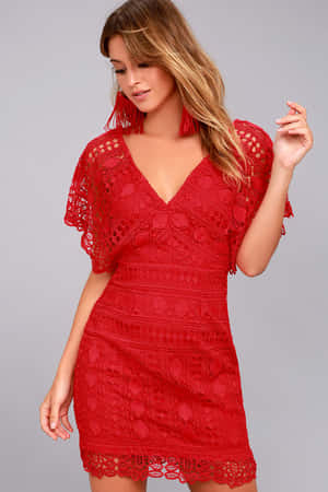 Elegant Woman In Stunning Red Lace Dress Wallpaper