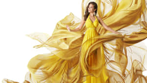 Elegant Woman In Sunny Yellow Dress Wallpaper