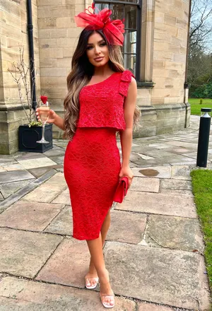 Elegant Woman Wearing A Stunning Red Lace Dress Wallpaper