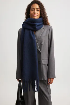 Elegant Woman Wearing Navy Blue Scarf Wallpaper