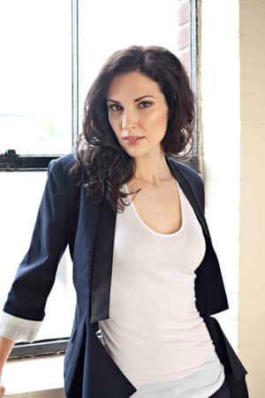 Elegant Woman Window Light Portrait Wallpaper