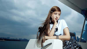 Elegant Woman Yacht Photoshoot Wallpaper