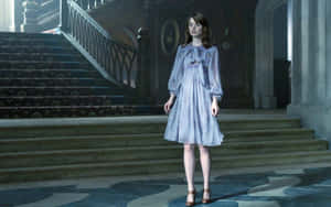 Elegant Womanin Historic Mansion Foyer Wallpaper