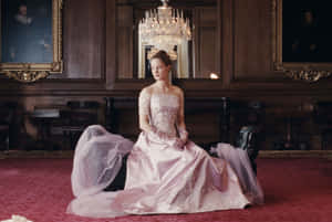 Elegant Womanin Historical Dress Phantom Thread Wallpaper