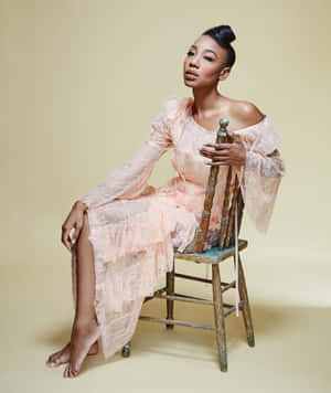 Elegant Womanin Peach Dress Wallpaper