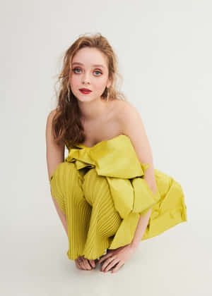 Elegant Yellow Dress Portrait Wallpaper