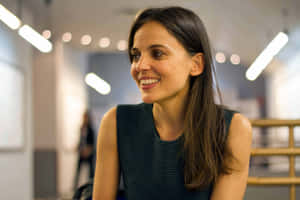 Elena Anaya Striking A Pose Against A Scenic Backdrop Wallpaper