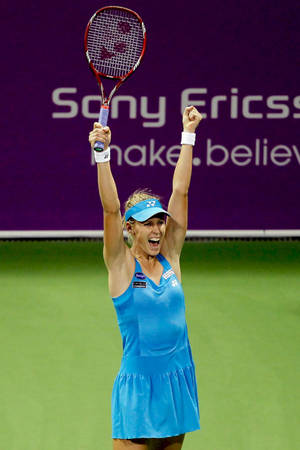 Elena Dementieva Celebrating Victory On Court Wallpaper