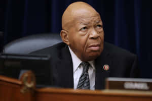 Elijah Cummings In Black Looking To The Right Wallpaper