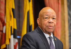Elijah Cummings In Black Looking To The Side Wallpaper