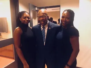 Elijah Cummings Smiling And Posing With Women Wallpaper