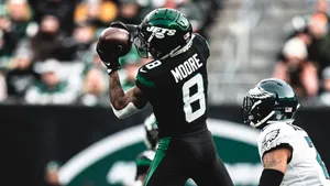 Elijah Moore Catching Football New York Jets Wallpaper